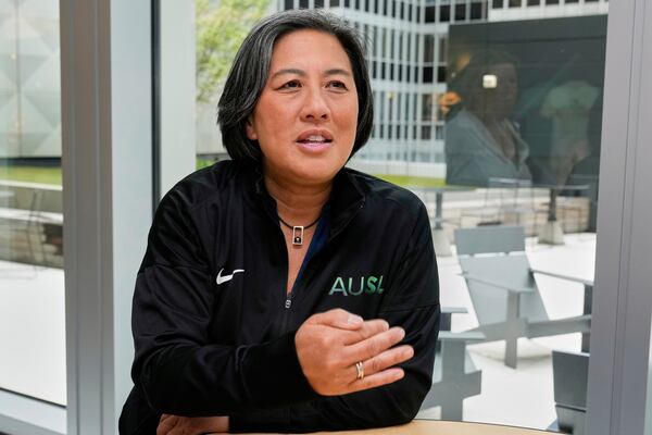 Athletes Unlimited Softball League Commissioner Kim Ng, a former Major League Baseball executive, is interviewed at Major League Baseball's headquarters in New York, Thursday, May 29, 2025. (AP Photo/Richard Drew)