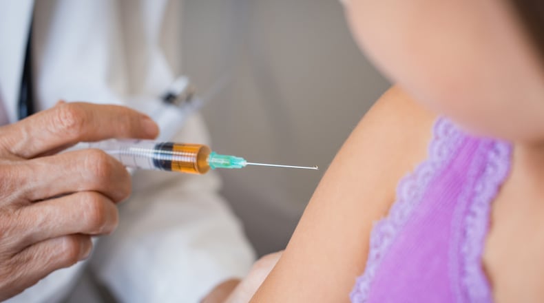 Kids’ reactions to shots may range from a mild anxiety to a full-blown meltdown, say pediatricians. (Dreamstime/TNS)