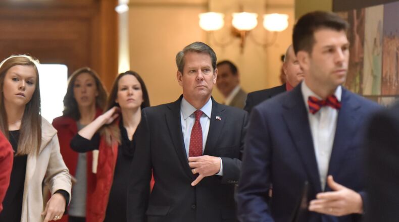 Gov.-elect Brian Kemp arrives at a press conference. HYOSUB SHIN / HSHIN@AJC.COM