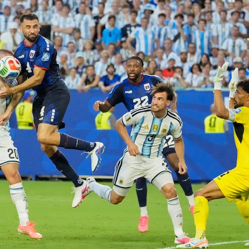 Argentina's Alexis Mac Allister (20) and Cape Verde's Pico Lopes (4) compete for the ball during the World Cup round of 32 soccer match between Argentina and Cape Verde in Miami Gardens, Fla., Friday, July 3, 2026. (AP Photo/Chris Carlson)