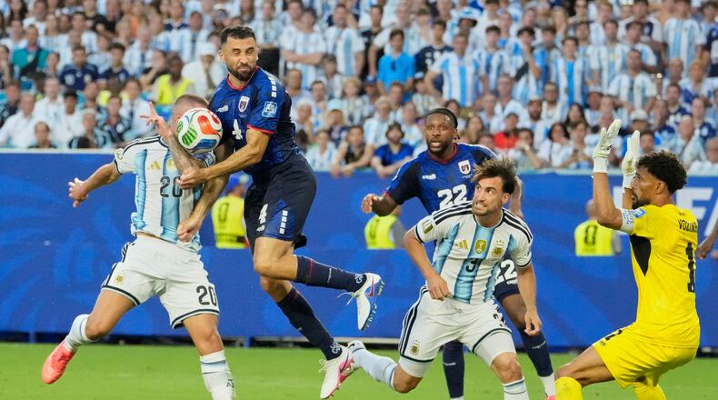 Argentina's Alexis Mac Allister (20) and Cape Verde's Pico Lopes (4) compete for the ball during the World Cup round of 32 soccer match between Argentina and Cape Verde in Miami Gardens, Fla., Friday, July 3, 2026. (AP Photo/Chris Carlson)
