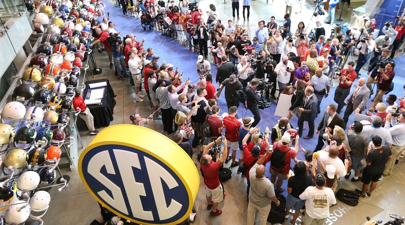 Alabama head coach Nick Saban arrives for his SEC Media Days press conference with Alabama fans lining the carpet at the College Football Hall of Fame Wednesday, July 18, 2018, in Atlanta.