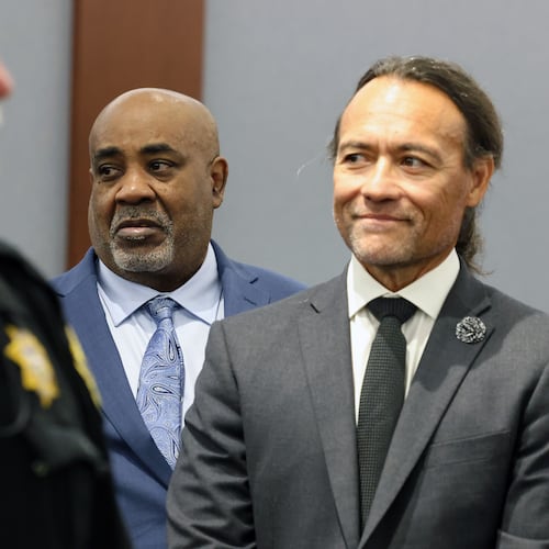 Duane Davis, center, stands with his attorney Michael Sanft, right, as prospective jurors enter the courtroom during the fourth day of jury selection for his murder trial in Clark County District Court at the Regional Justice Center on Thursday, Aug. 13, 2026, in Las Vegas. Davis was indicted on murder charges for his involvement in the killing of rapper Tupac Shakur in 1996. (Bizuayehu Tesfaye/Las Vegas Review-Journal via AP, Pool)