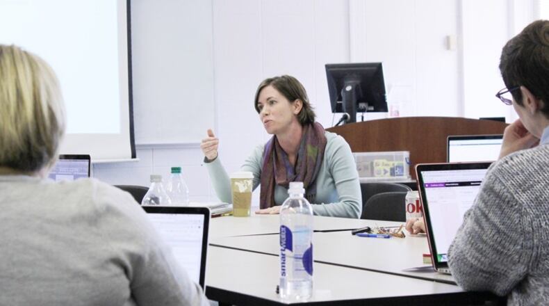 Gretchen Thomas, an instructor in the UGA College of Education’s department of career and information studies, leads a session for faculty on digital innovations in classroom teaching. Thomas is part of a program in the college that teaches the latest in learning technology to faculty and helps them develop new online teaching strategies. (Photo credit: Kristen Morales/UGA)