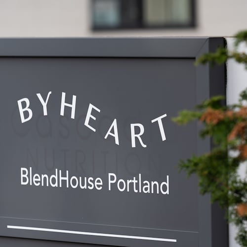 A sign for ByHeart, a manufacturer of organic baby formula, is displayed outside a building that houses a plant for the company on Tuesday, Nov. 11, 2025, in Portland, Ore. (AP Photo/Jenny Kane)