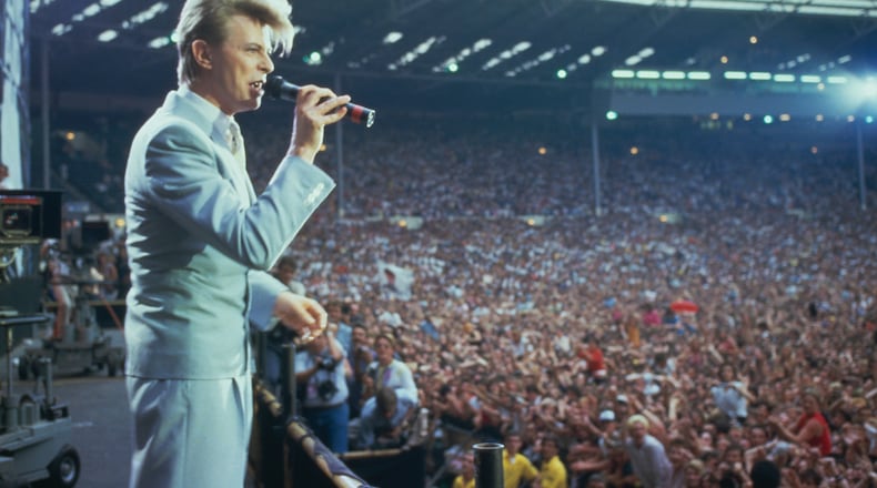 English singer David Bowie performing at the Live Aid concert at Wembley Stadium in London, 13th July 1985. The concert raised funds for famine relief in Ethiopia. (Photo by Georges De Keerle/Getty Images)
