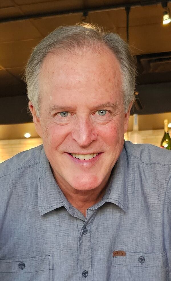 Scott Sweeney loved nothing better than being in the kitchen, cooking a delicious meal for the family and friends he loved. (Courtesy of the Sweeney family)
