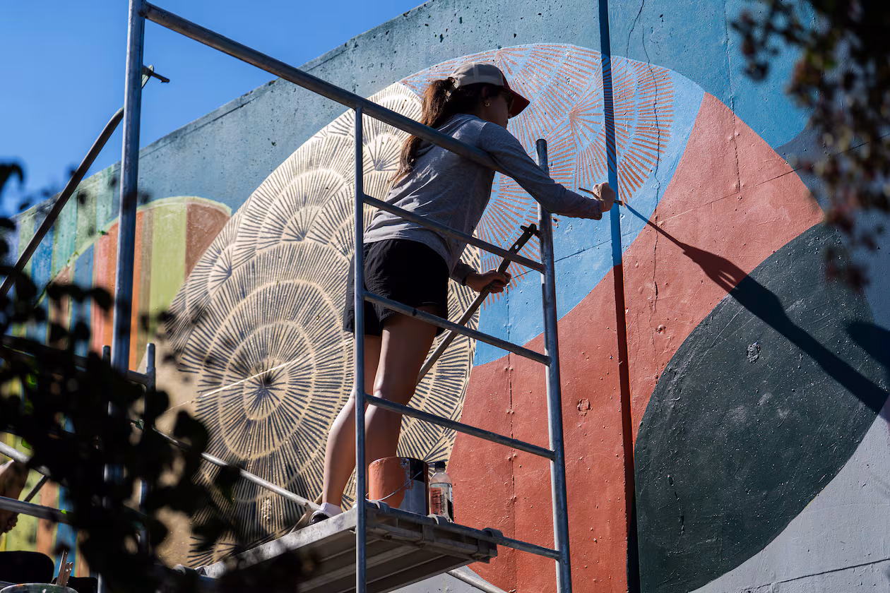 Local artists create murals live at the 11th annual Forward Warrior festival in the Cabbagetown neighborhood of Atlanta. (Olivia Bowdoin for the AJC/2025)