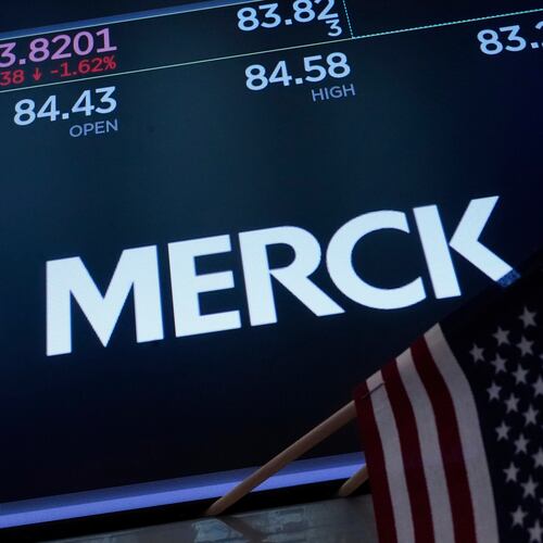 FILE - The logo for Merck appears above a trading post on the floor of the New York Stock Exchange, May 1, 2025. (AP Photo/Richard Drew, File)