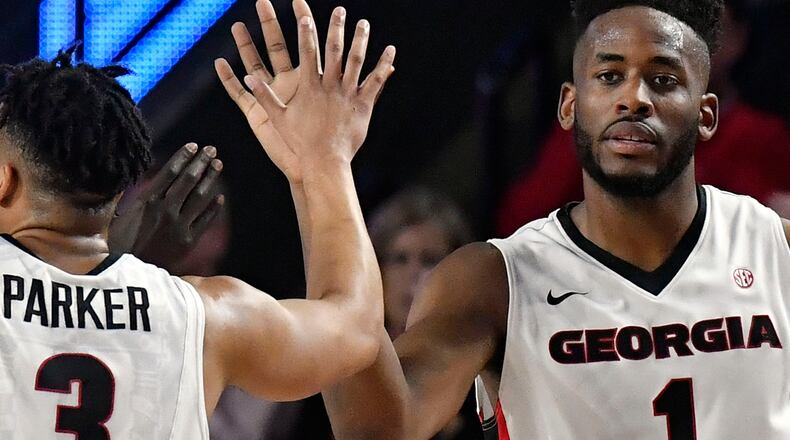 Yante Maten (1) gives a high five to his teammate Juwan Parker of the Georgia Bulldogs against the Tennessee Volunteers at Stegeman Coliseum on February 17, 2018 in Athens, Georgia. (Photo by Mike Comer/Getty Images)