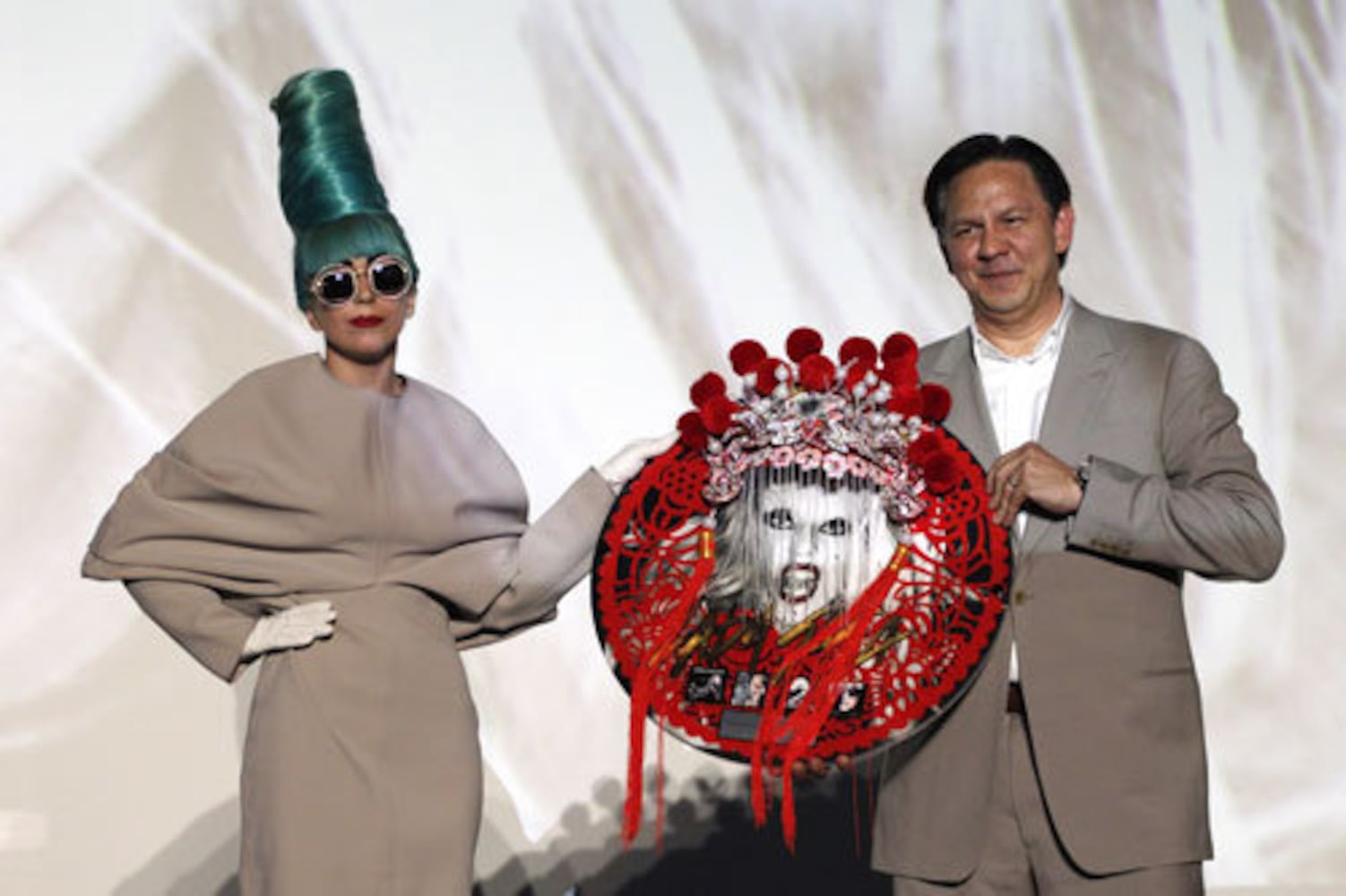 Lady Gaga rocks a green beehive in Singapore