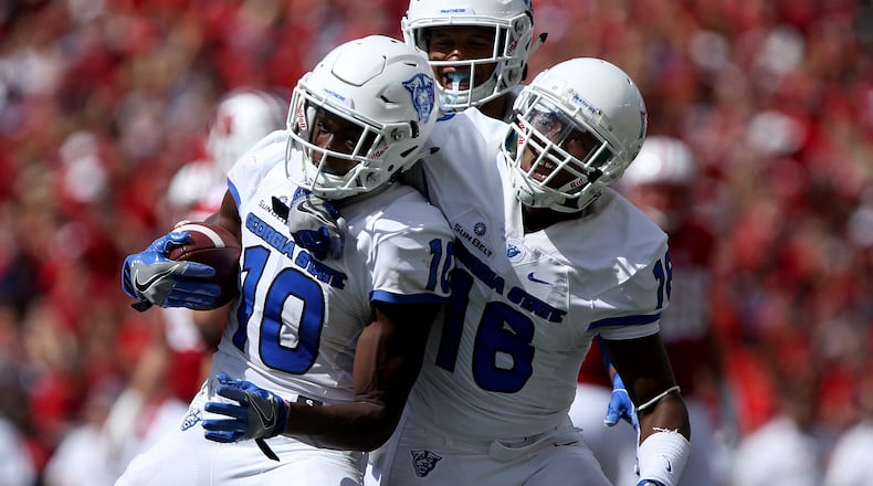 MADISON, WI - SEPTEMBER 17: Chandon Sullivan #10 and Penny Hart #18 of the Georgia State Panthers celebrate after Sullivan made an interception against the Wisconsin Badgers in the fourth quarter at Camp Randall Stadium on September 17, 2016 in Madison, Wisconsin. (Photo by Dylan Buell/Getty Images)