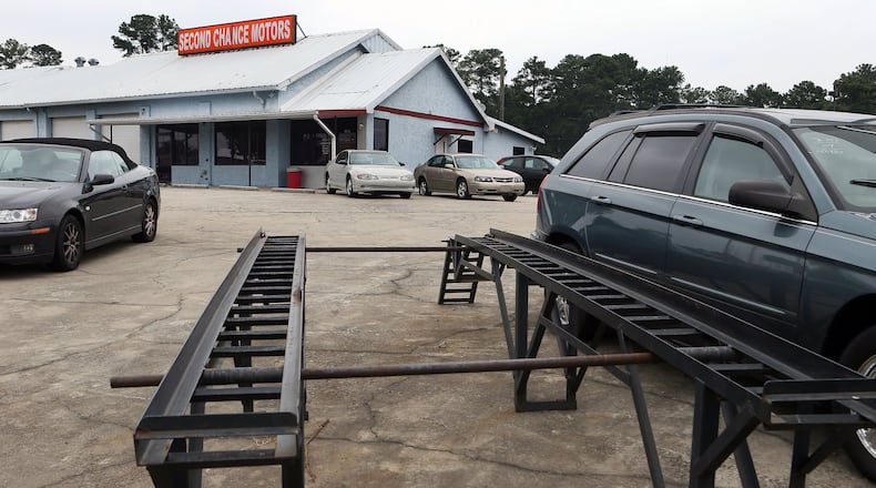 Photo of the now-defunct, Atlanta-based used car business called Second Chance Motors lot in Marietta on Friday August 30th, 2013.