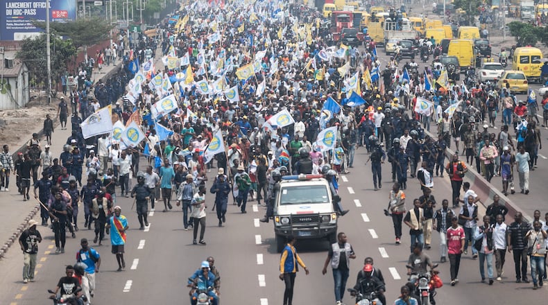 People march during a protest organized by opposition parties against constitutional changes proposed by President Felix Tshisekedi, in Kinshasa, Congo, Tuesday, Sept. 15, 2026. (AP Photo/Samy Ntumba Shambuyi)