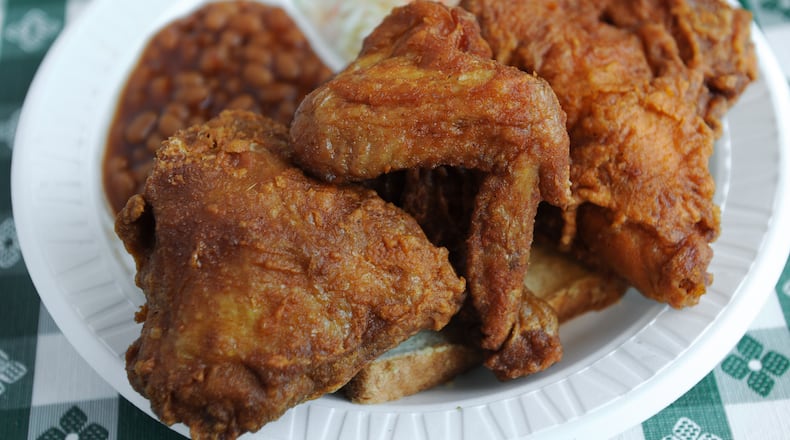 OCTOBER: Wyatt Williams writes of Gus's World Famous Fried Chicken in downtown Atlanta, "The fried chicken here is a necessity. A notch in your culinary life will go unfilled if you do not taste it." Read the full review here. Pictured: Half Chicken Plate with baked beans, slaw and white bread. (Becky Stein Photography)