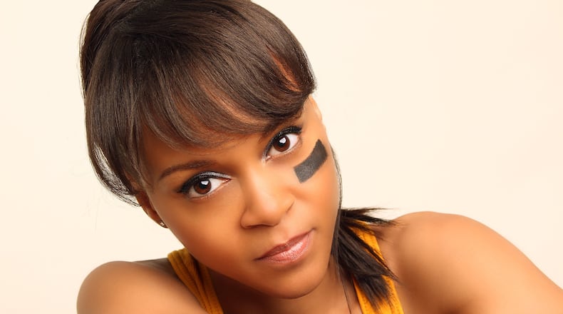 Kerisse Hutchinson wrote and performs in a one-woman play about Lisa “Left Eye” Lopes. CONTRIBUTED BY LOUIS CUTHBERT
