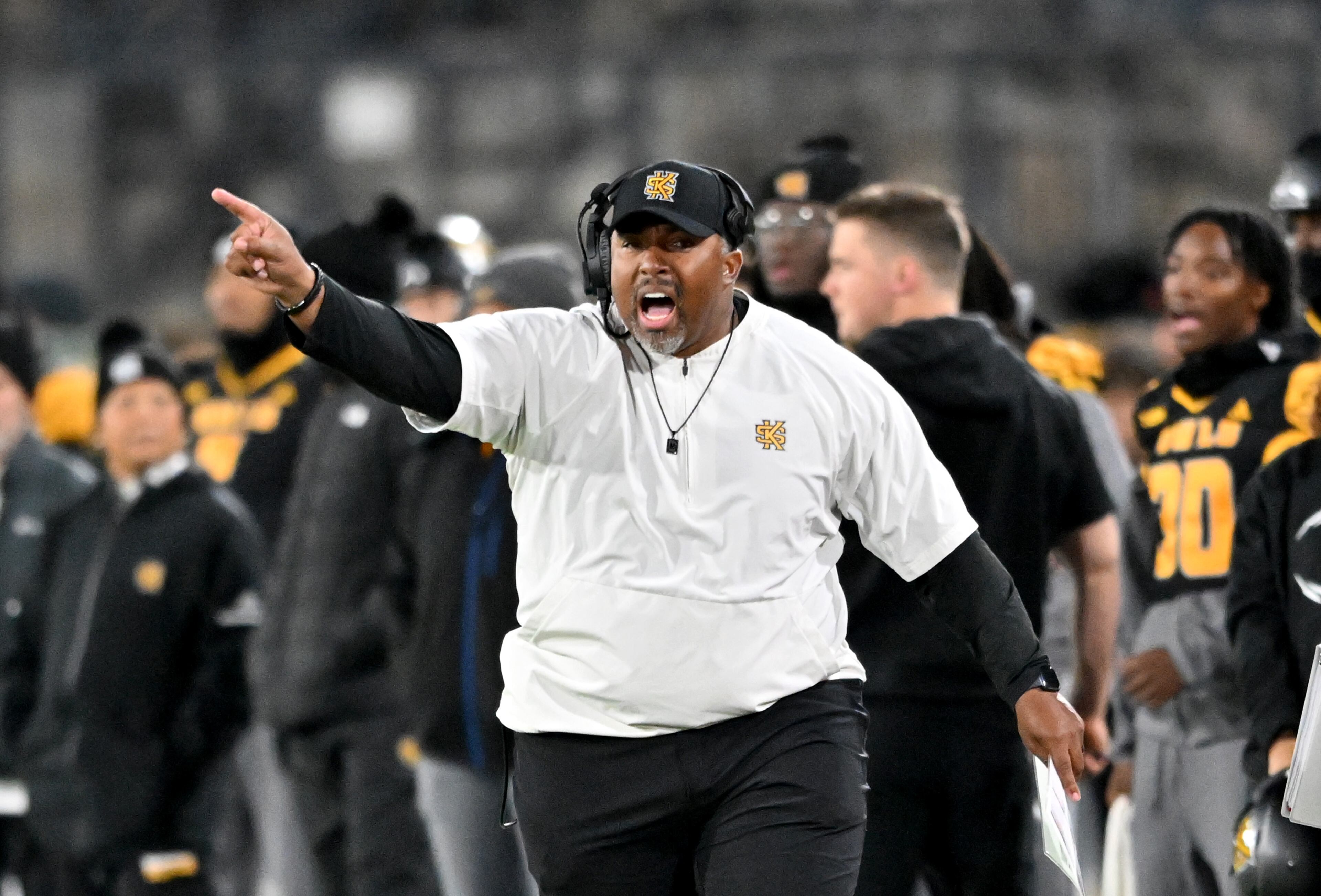 Kennesaw State head coach Jerry Mack shouts instructions during the first half in an NCAA college football game at Fifth Third Stadium, Tuesday, October 28, 2025 in Kennesaw. (Hyosub Shin / AJC)