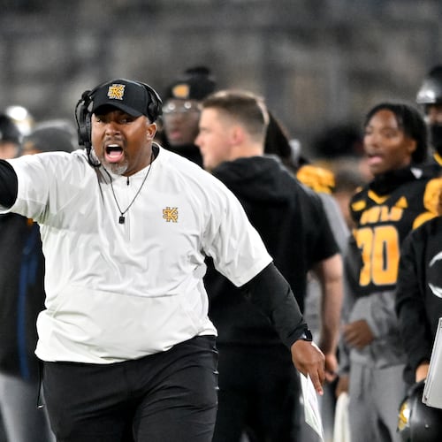 Kennesaw State head coach Jerry Mack shouts instructions during the first half in an NCAA college football game at Fifth Third Stadium, Tuesday, October 28, 2025, in Kennesaw. (Hyosub Shin/AJC)