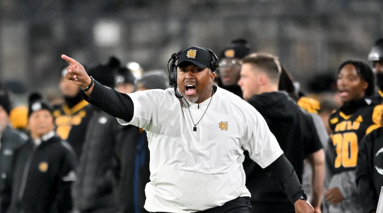 Kennesaw State head coach Jerry Mack shouts instructions during the first half in an NCAA college football game at Fifth Third Stadium, Tuesday, October 28, 2025, in Kennesaw. (Hyosub Shin/AJC)