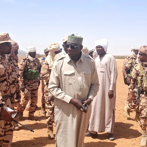 In this photo release by the Chadian Press Agency, Limane Mahamat, deputy prime minister, center, arrives at Igote village following a clash between two families over a water point, in the Wadi Fira, Chad, Sunday, April 26, 2026. (Chadian Press Agency via AP)