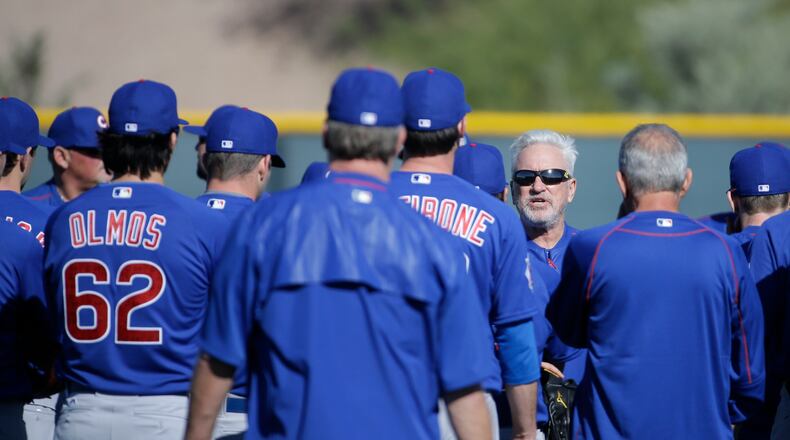 Chicago Cubs manager Joe Maddon talks during a spring baseball practice in Mesa, Ariz., Saturday, Feb. 20, 2016. (AP Photo/Chris Carlson)
