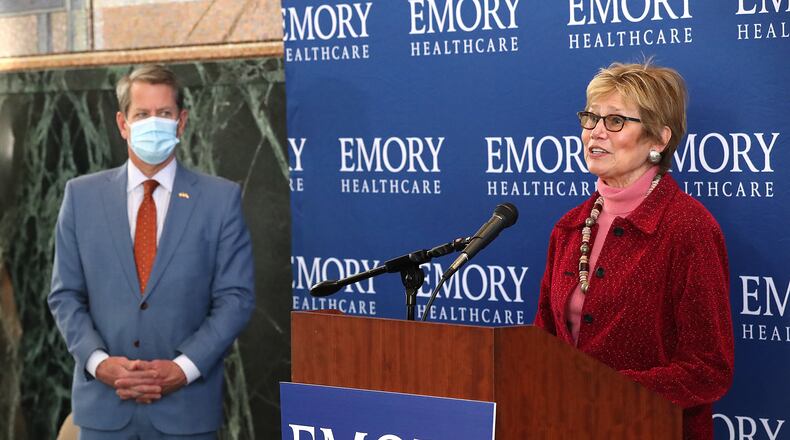 Gov. Brian Kemp and DPH Commissioner Dr. Kathleen Toomey take questions during a press conference at Emory University to discuss the Moderna vaccine rollout on Tuesday.  “Curtis Compton / Curtis.Compton@ajc.com”