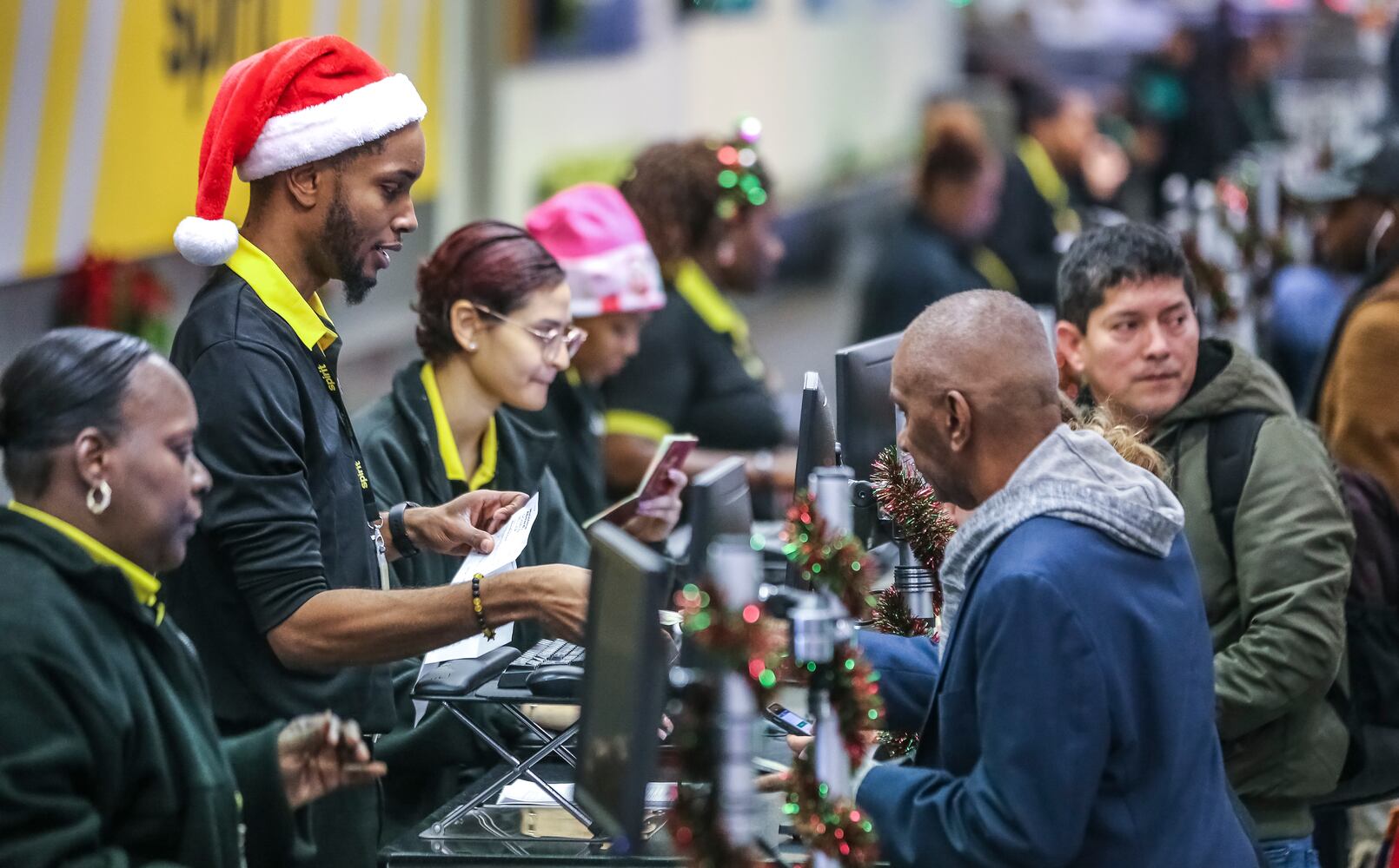 Holiday travelers navigate Atlanta's Hartsfield-Jackson