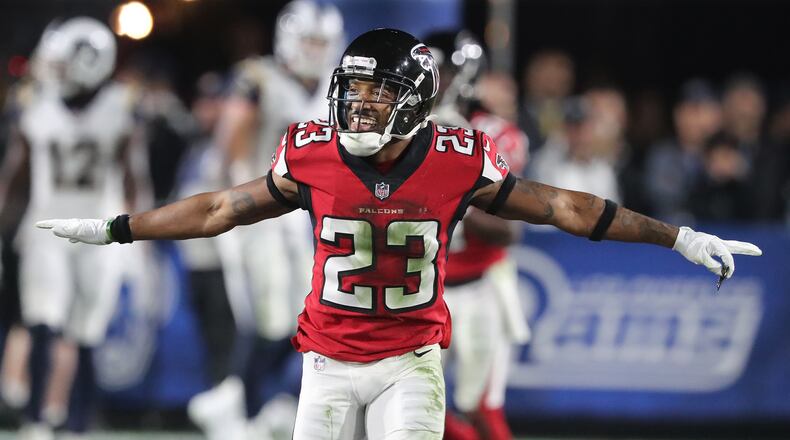 January 6, 2018 Los Angeles: Falcons cornerback Robert Alford runs down the field celebrating stopping the Rams on fourth down to take over on downs in the final minutes of a 26-13 victory in their NFL Wild Card Game on Saturday, January 6, 2018, in Los Angeles.    Curtis Compton/ccompton@ajc.com