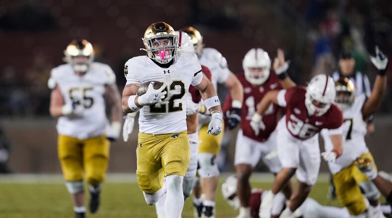 Notre Dame running back Aneyas Williams (22) runs for a touchdown during the second half of an NCAA college football game against Stanford, Saturday, Nov. 29, 2025, in Stanford, Calif. (AP Photo/Godofredo A. Vásquez)