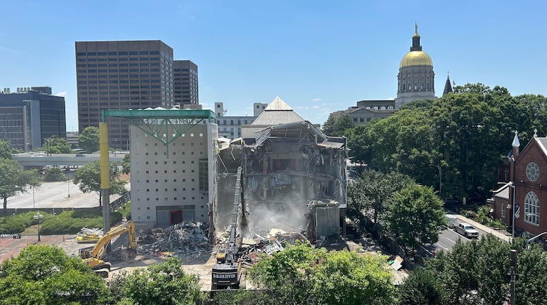 The building had sat mostly vacant for nearly 20 years as a quirky afterthought before being demolished on Thursday afternoon with little fanfare surrounding it. (Photo Courtesy of Thomas Wheatley/Axios)