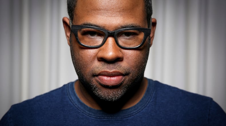 In this Thursday, Feb. 9, 2017 photo, Jordan Peele poses for a portrait at the SLS Hotel in Los Angeles. Peele's directorial debut, "Get Out," in theaters Friday, Feb. 24, is one of those rare creations that functions both as a taut psychological thriller and as searing social commentary about racism in the modern era. (Photo by Rich Fury/Invision/AP)