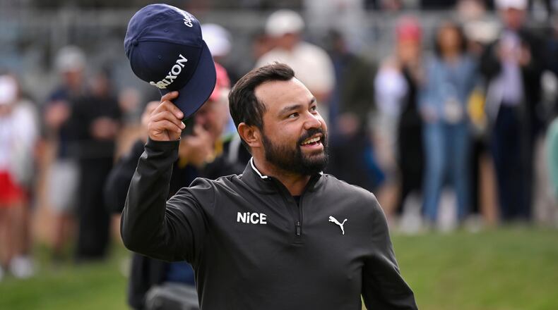 J.J. Spaun waves to fans after winning the Valero Texas Open golf tournament in San Antonio, Sunday, April 5, 2026. (AP Photo/Darren Abate)