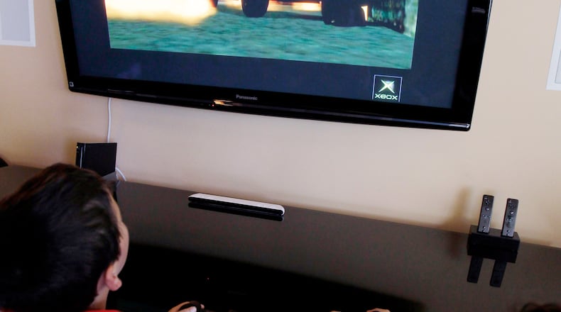 Will no homework policies lead to more outdoor play or indoor screen time? (AP Photo)