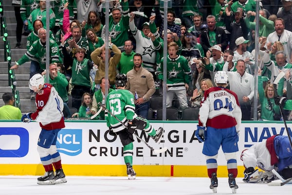 Dallas Stars center Wyatt Johnston (53) celebrates after scoring during the second period of Game 5 of a first-round NHL hockey playoff series against the Colorado Avalanche in Dallas, Monday, April 28, 2025. (AP Photo/Gareth Patterson)