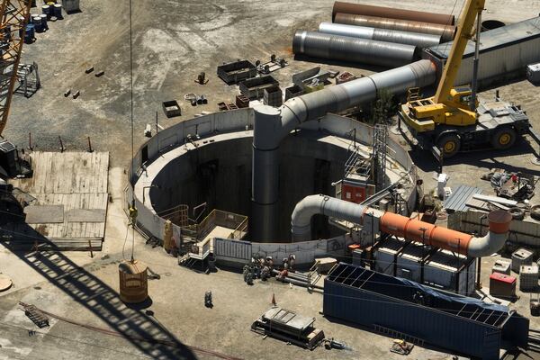 An aerial view shows the only entrance to an industrial tunnel in the Wilmington neighborhood of Los Angeles, Thursday, July 10, 2025, after a section of the tunnel partially collapsed Wednesday night. (AP Photo/Jae C. Hong)