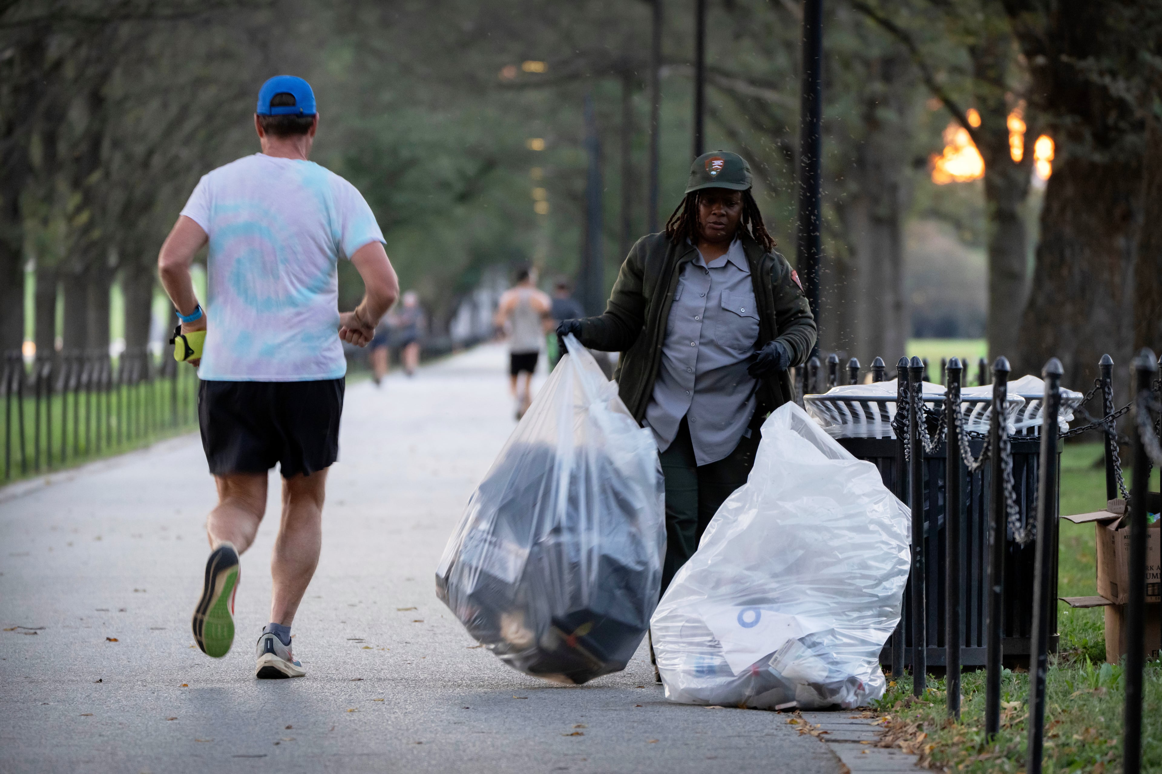 A National Park Service employee emptied trash containers along the National Mall in Washington on Wednesday.