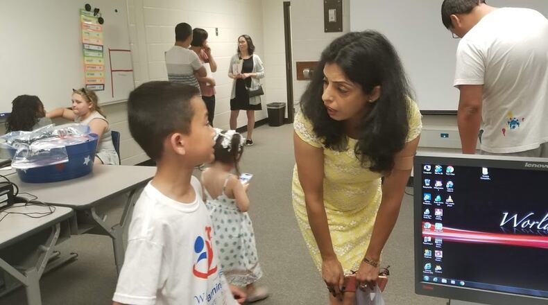 Nidhi Jain, founder of WhizLearning Kids, talks to participants in the Scratch competition on May 18 at Suwanee Elementary School. Arushi Mittal for WhizLearning Kids