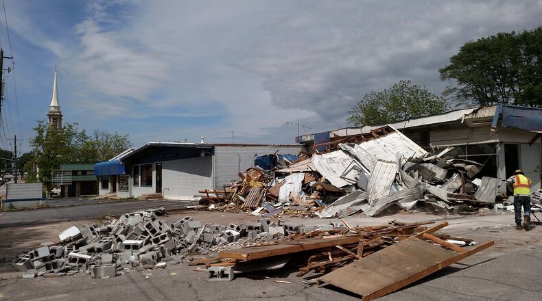 Now that the former Lawrenceville Auto Parts at 15 South Clayton St. demolition is complete, additional funds are needed for grading the lot that will provide parking for the Lawrenceville Lawn. Courtesy City of Lawrenceville