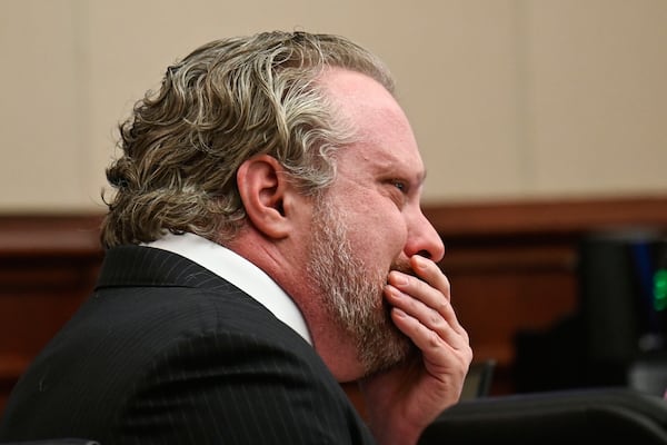 James Craig wipes his face during opening arguments in his murder trial, as he is accused of killing his wife, at the Arapahoe District Court, Tuesday, July 15, 2025, in Centennial, Colo. (Stephen Swofford via Denver Gazette, Pool)