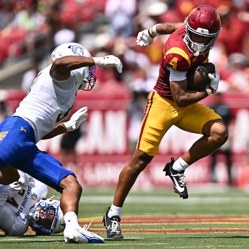 Southern California wide receiver Trent Mosley (4) runs with the ball during the first half of an NCAA college football game against San Jose State, Saturday, Aug. 29, 2026, in Los Angeles. (AP Photo/William Liang)