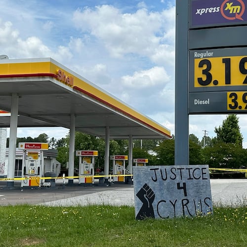 FILE - A sign calling for justice is for Cyrus Carmack-Belton is seen outside a gas station June 1, 2023, in Columbia, S.C. (AP Photo/Jeffrey Collins, File)