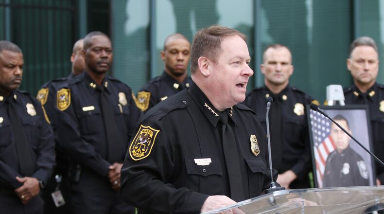 DeKalb County police’s former Chief James Conroy speaks at a ceremony to honor Master Police Officer Norman Larsen and DeKalb County police K-9 Indi outside of DeKalb County police headquarters in Tucker, Georgia on Wednesday, March 13, 2019.