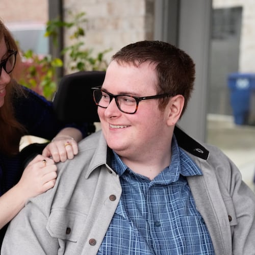 Kaci LaFon, left, appears with her husband Collin LaFon at their home in Trussville, Ala., on on Friday, Nov. 21, 2025. (AP Photo/Brynn Anderson)