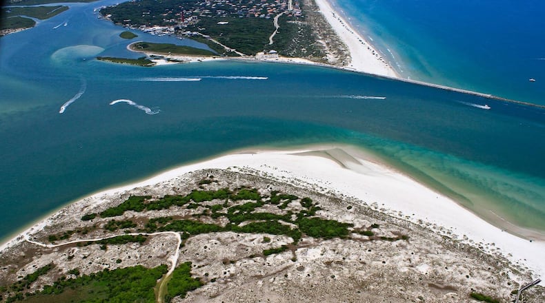 The Halifax River flows to the Atlantic, separating Ponce de Leon Inlet Lighthouse Museum and the Smyrna Dunes Park (note the park’s boardwalks).