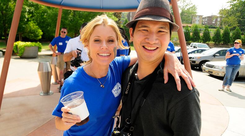 Emmy nominee Julie Bowen (Modern Family) with AJC writer Rodney Ho at the ribbon cutting cermony for the Maxwell House's $50,000 award to the Adamsville Recreation Center. Emmy nominee Julie Bowen (Modern Family) with AJC writer Rodney Ho at the ribbon cutting cermony for the Maxwell House's $50,000 award to the Adamsville Recreation Center.
