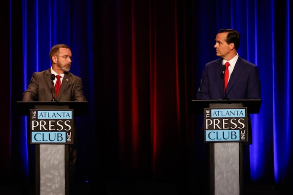 Republican candidates for Georgia's 11th Congressional District (l-r) Rob Adkerson and John Cowan debate at the Atlanta Press Club Loudermilk-Young Debate Series at Georgia Public Broadcasting in Atlanta earlier this month. (Arvin Temkar/AJC)