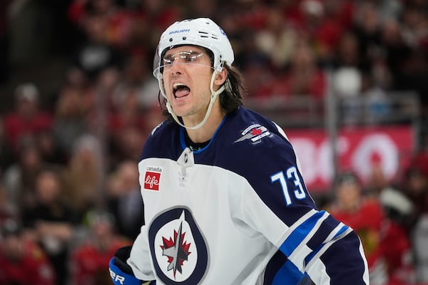 Winnipeg Jets left wing Brandon Tanev argues with an official during the first period of an NHL hockey game against the Chicago Blackhawks, Saturday, April 12, 2025, in Chicago. (AP Photo/Erin Hooley)