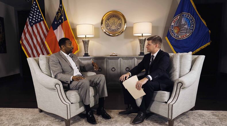 Atlanta Mayor Andre Dickens answers questions in an exclusive interview Friday, March 24, 2023, with The Atlanta Journal-Constitution's Greg Bluestein (right) on the Atlanta Public Safety Training Center in DeKalb County. (Ryon Horne / Ryon.Horne@ajc.com)
