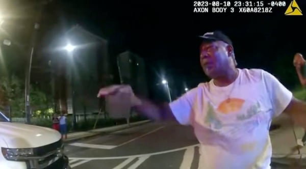 This image from bodycam video provided by the Atlanta Police Department shows Johnny Hollman speaking with Officer Kiran Kimbrough on Aug. 10, 2023. (Courtesy of Atlanta Police Department)