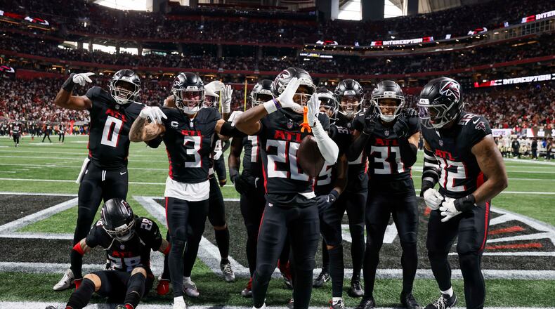Atlanta Falcons cornerback Dee Alford (20), center, reacts after an interception in the second half of an NFL football game against the New Orleans Saints at Mercedes-Benz Stadium in Atlanta on Sunday, January 4, 2026.
(Miguel Martinez/AJC)